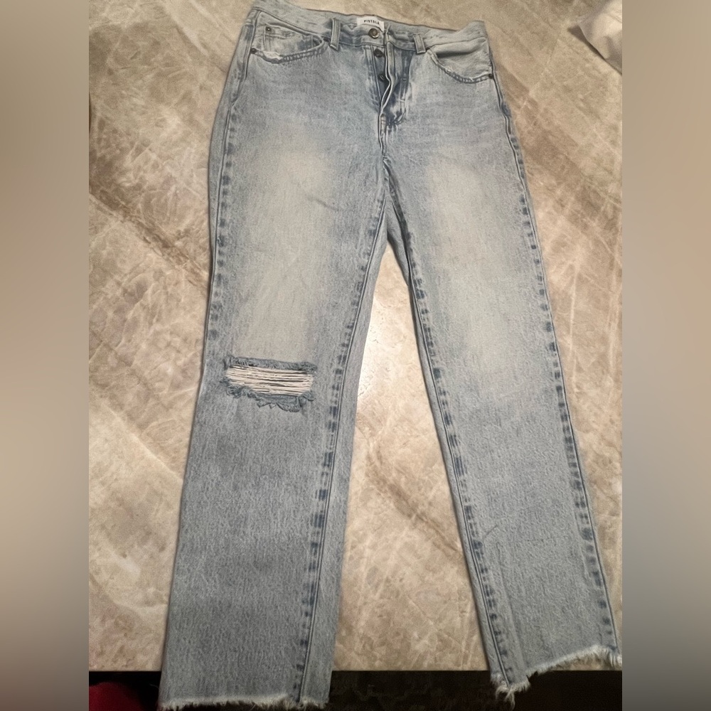 Pistola straight leg jean. 100% cotton. Distressed knee. Raw hem.